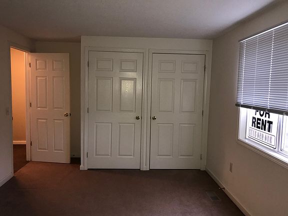 Master bedroom his and her closets