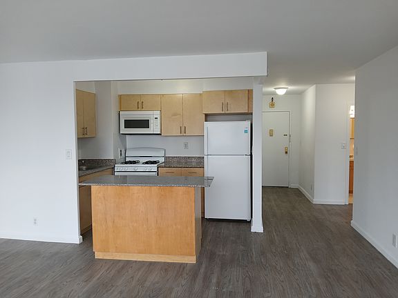 kitchen island with brand new home appliances