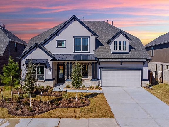 Welcome home to 8689 Burdekin Road located in the master planned community of Northgrove and zones t