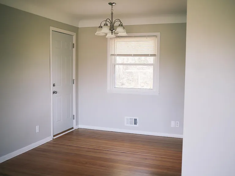 Interior access from garage into a nice sized room perfect for a dining table or home office.
