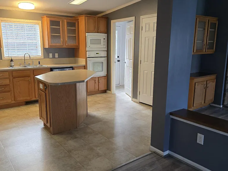 View of kitchen from dining room