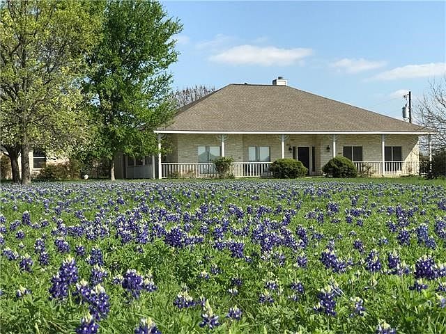 The lovely home has been totally remodeled and sits on 2 acres. This road is a private cut-de-sac ju