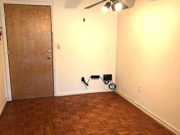 Dining area with wood parquet floor