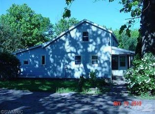 9224 Peck Lake Rd, Lowell, MI 49331