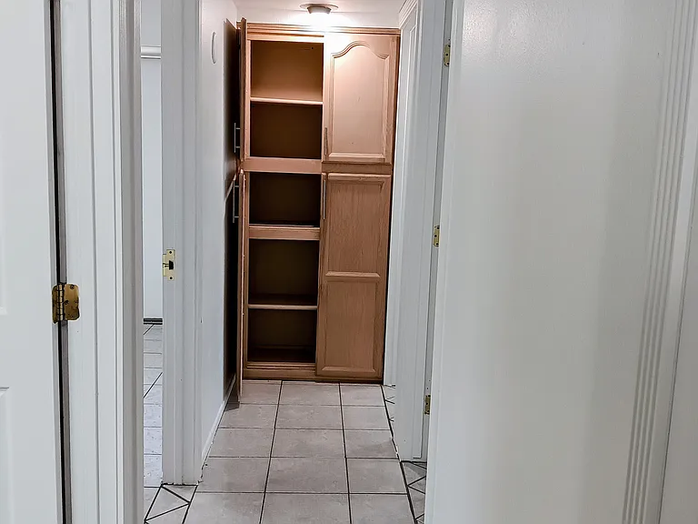 Hall closet one side open