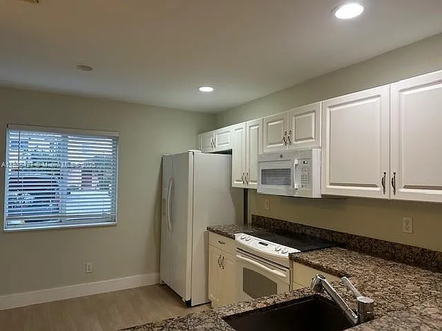 762 NW 208th Ter — Photo 6