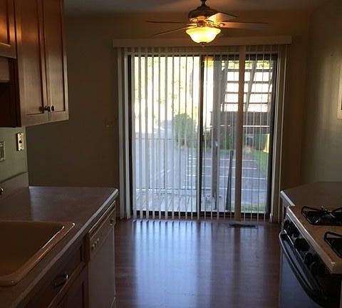 Galley kitchen w/area for table and slider to small balcony/deck