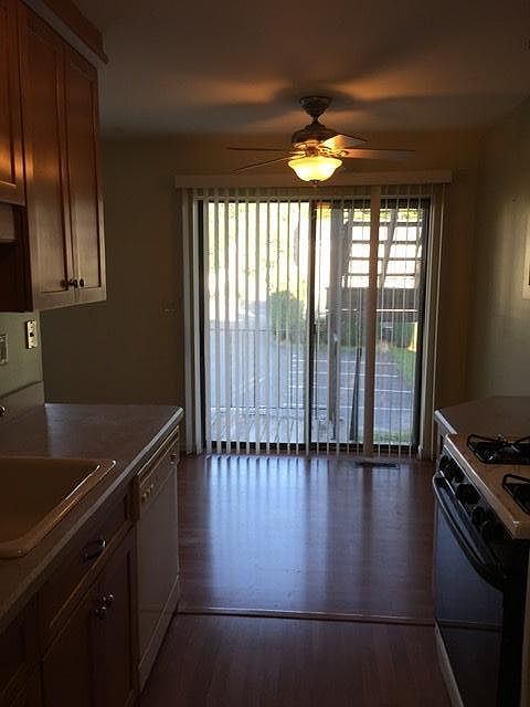 Galley kitchen w/area for table and slider to small balcony/deck