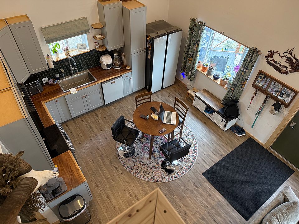 Overview of the kitchen space from the large loft above.