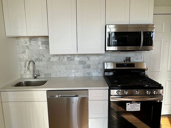 2nd image of 1924 S Throop St APT 12