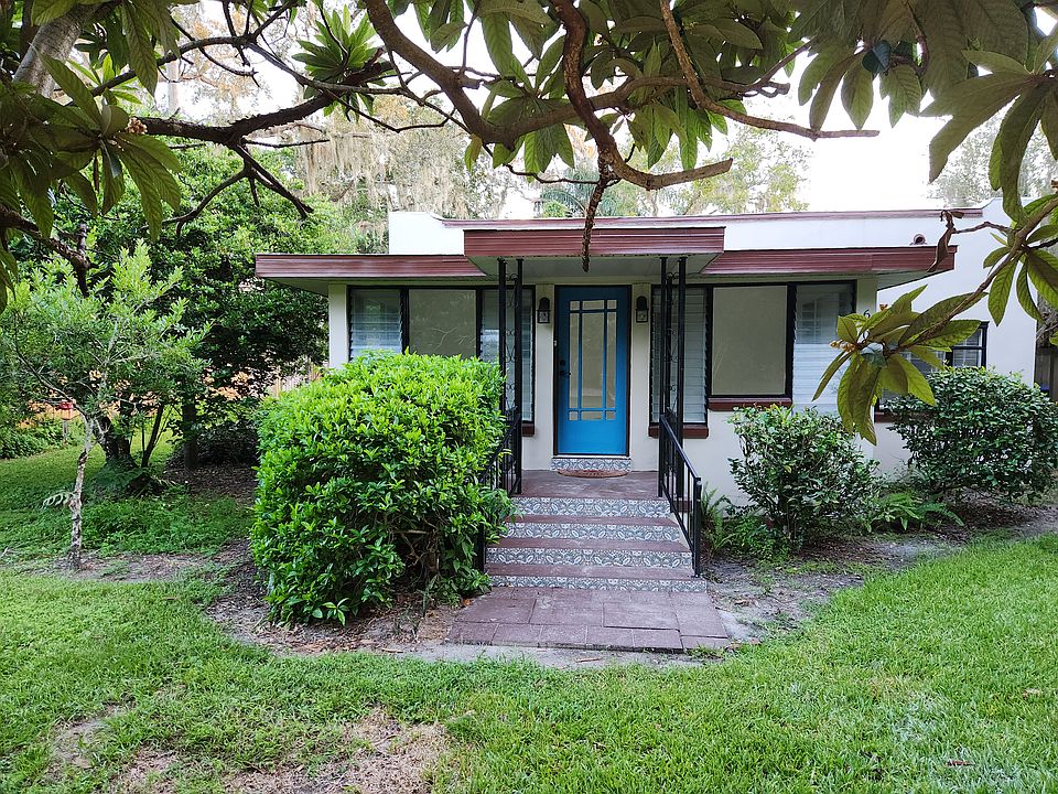 Front entrance; carport to the right with entry into laundry room and kitchen
