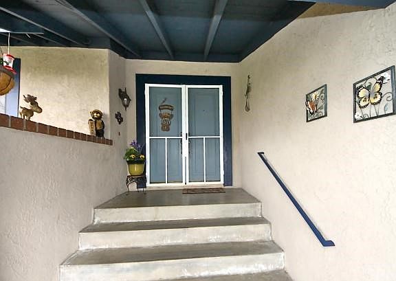 Covered entryway & double doors