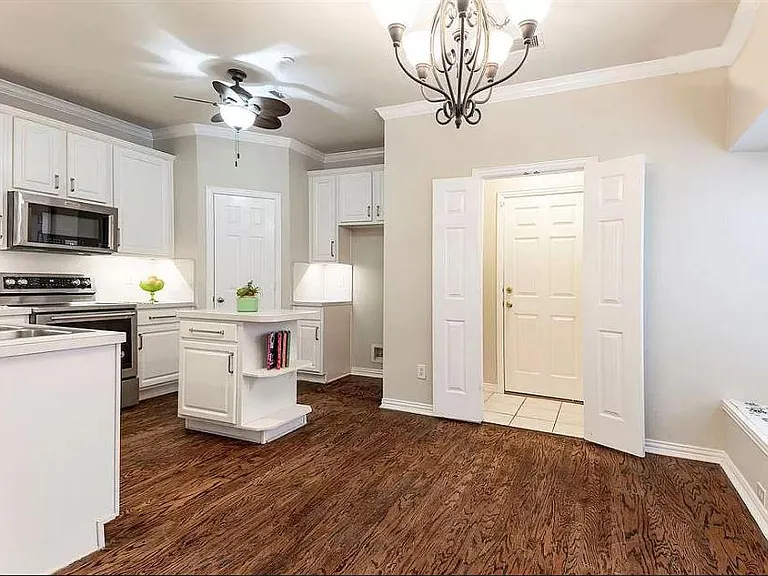 Looking northeast at Kitchen, Laundry & Dining. Garage is past Laundry. (Note: Rfgr./Washer & Dryer not shown)