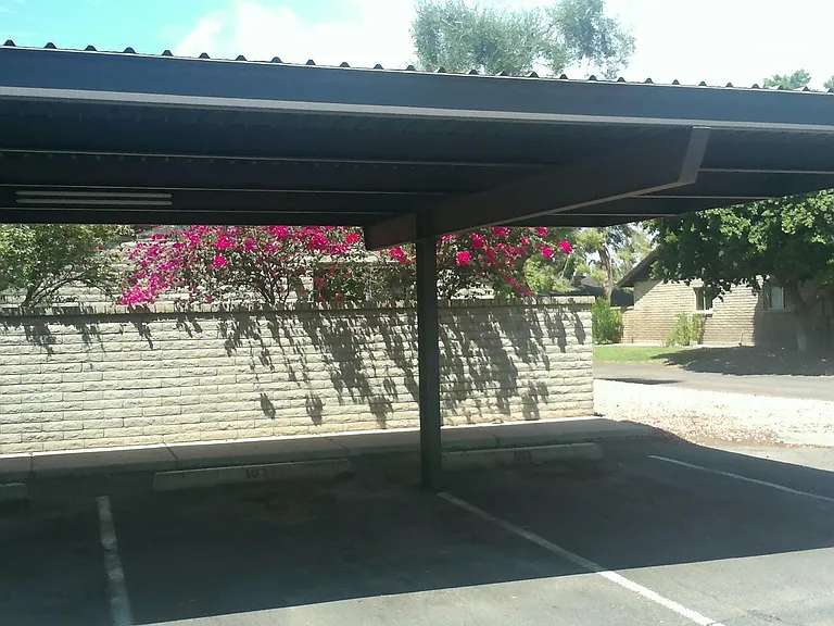 2 designated covered parking spaces included with unit. Uncovered guest and street parking available on first-come basis.