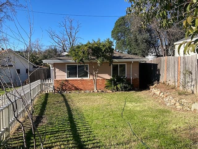 Private fenced front yard