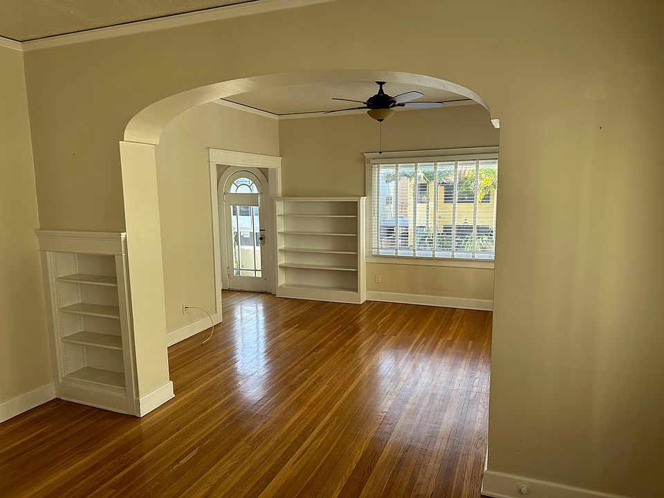 View of living room through dining room from kitchen door.