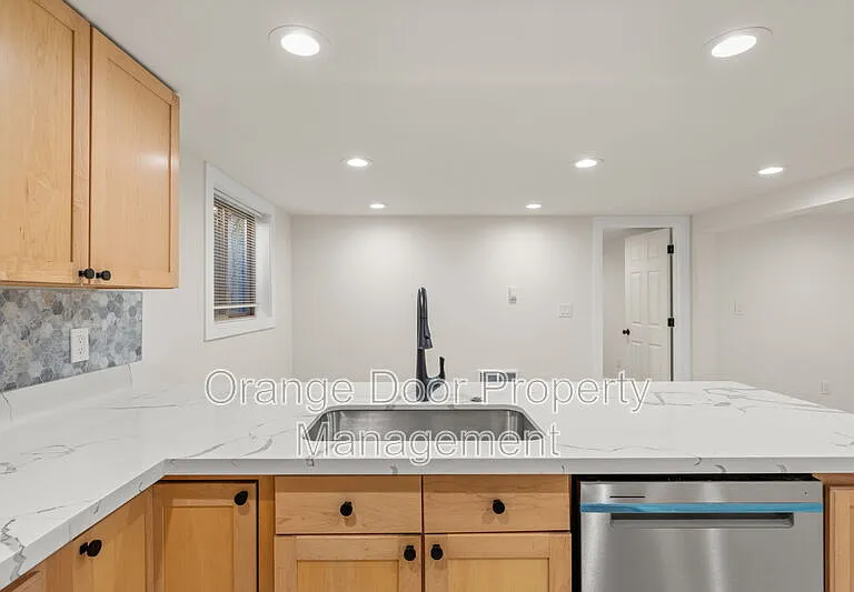 7727 Jones Ave NW — Photo 12