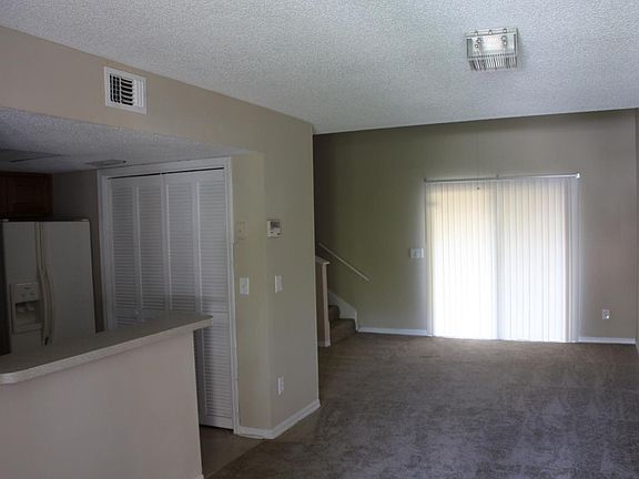 2nd image of 7671 Melissa Ct N #Townhome