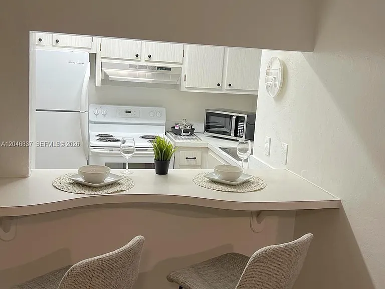 815 Middle River Dr #204 — Photo 14