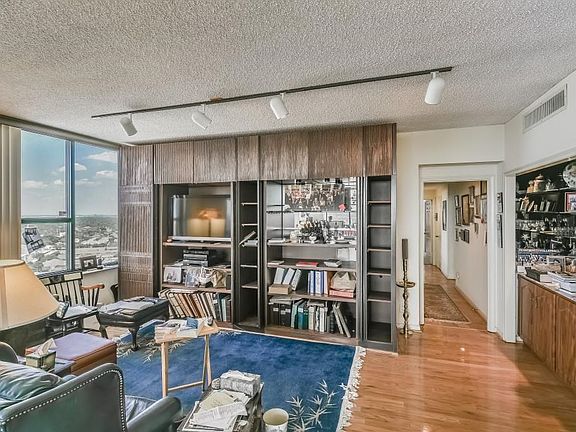 Alternative vieiw of the expansive living room with signature views of the Galleria area
