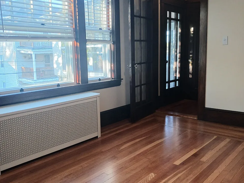 Fully refurbished original wood windows with weather sealing and storm windows provide energy-efficiency.