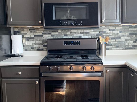 Tile Backsplash and Upgraded Appliances