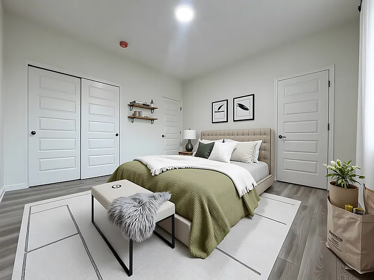Large master bedroom with dual closets