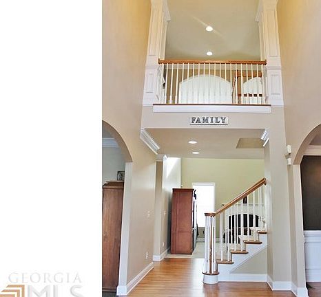 Walk into an open and spacious two story foyer and step into your large dining and living space which can be used as an office/library.