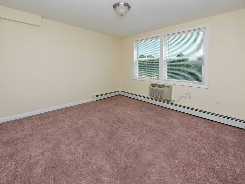 bedroom one, view standing in door way, closet on wall to the left