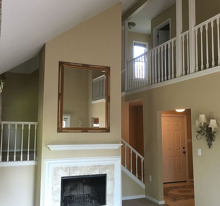 Two story family room w/FP