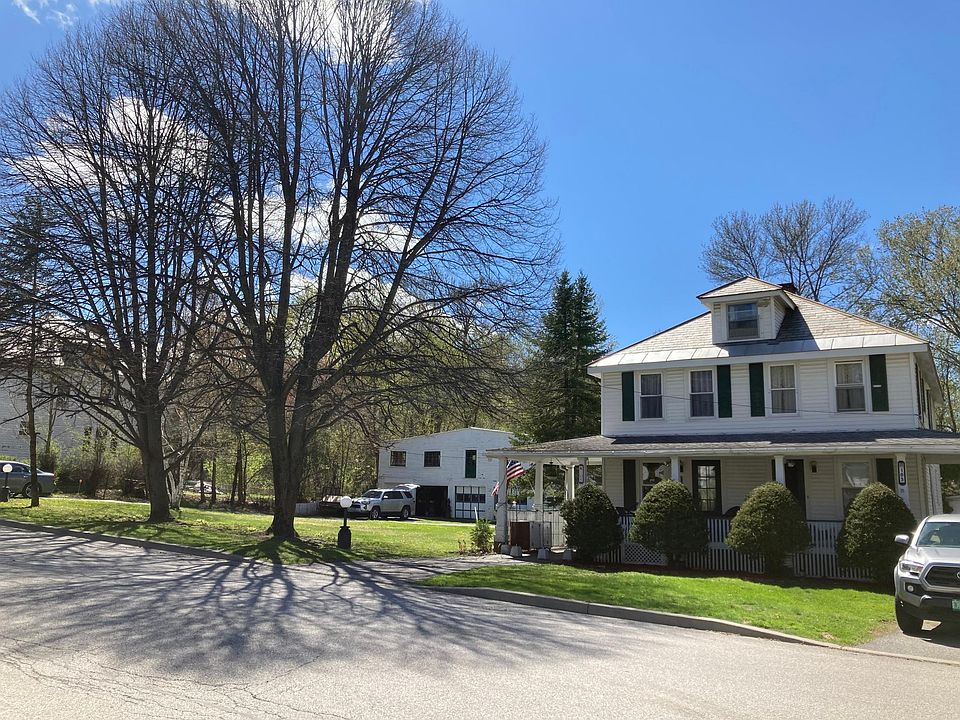 Exterior with garage in back of double lot