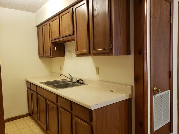 Kitchen showing several cabinets
