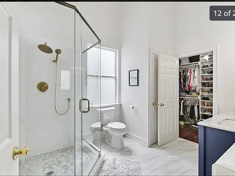 huge and new bathroom with a walk-in shower (the tub is in the other bathroom)