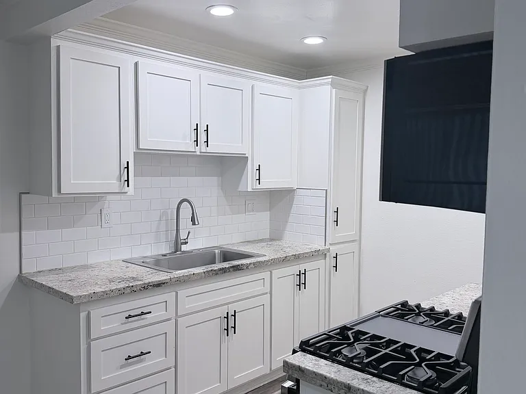 Newly renovated kitchen with plenty on cabinet storage