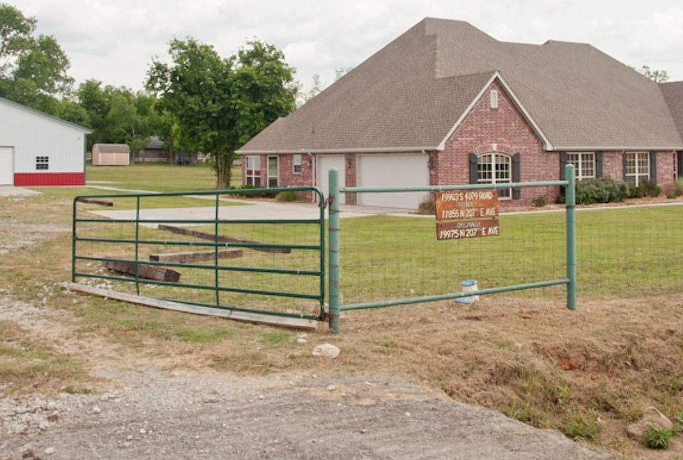 2.93 acres appx with gorgeous home over  4,000 sq ft and a 40x60 shop,  Owasso