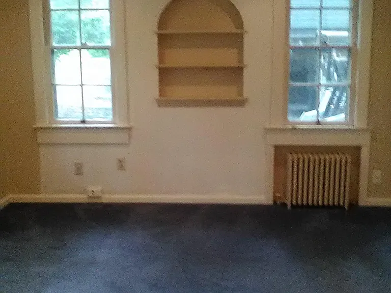 Living room, carpeted.