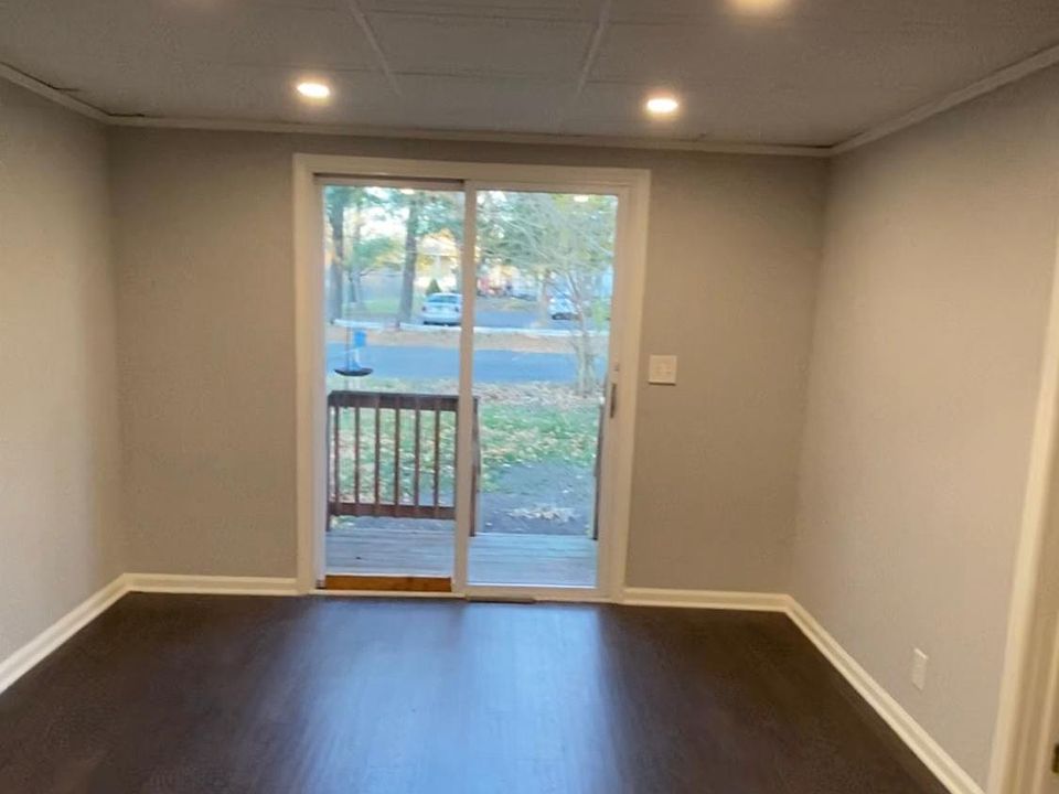 Dimmable lighting in kitchen and dining area leading out to your own deck and spacious yard . Enjoy sunny mornings here