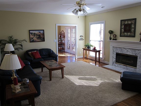 Den towards kitchen and screen porch