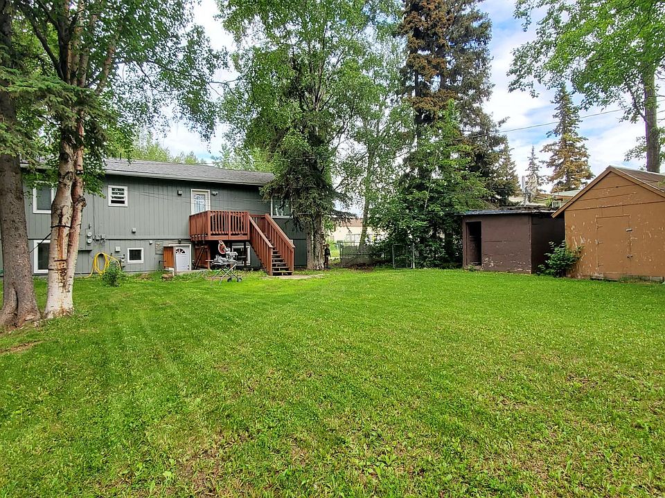 View from backyard- 2 storage sheds