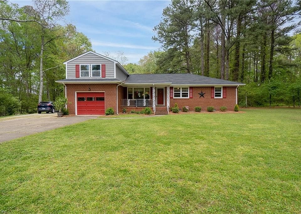 Brick Ranch on 1.4 acres set back off the road.
