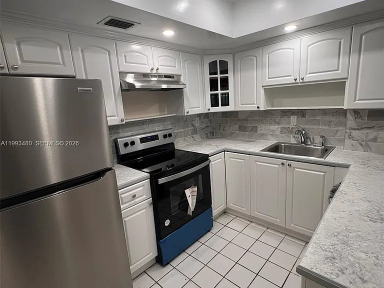 2605 NW 47th Ter #103 — Photo 3