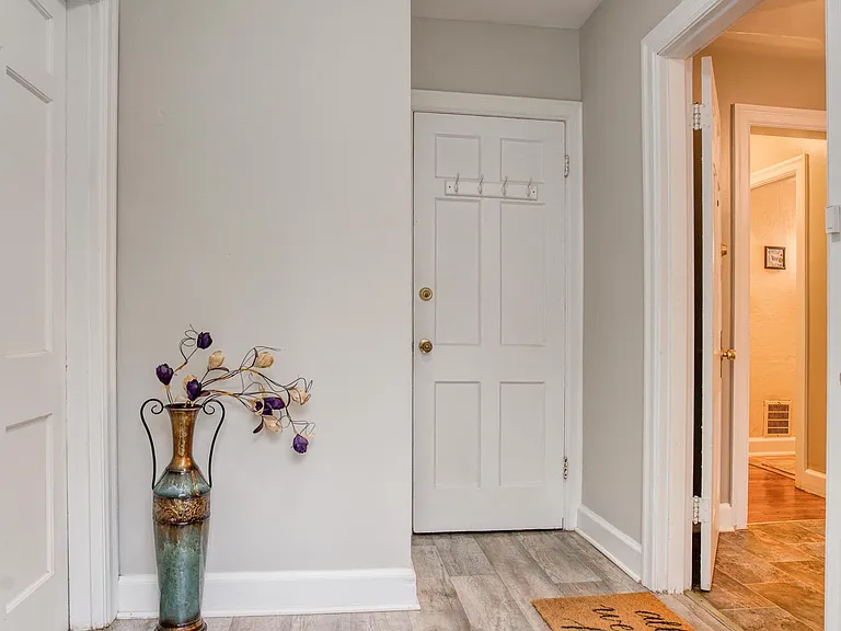 Mud room and entry to basement where there is washer/dryer and storage shared by all tenants.