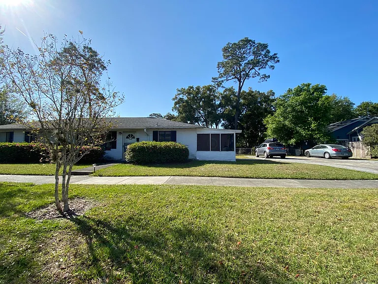 Screened porch and off street parking