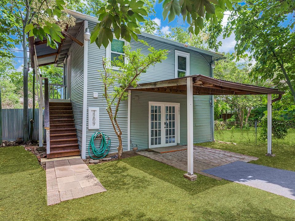 Pretty building at the back of the property. Top unit is the unit for rent. Bottom unit is not typically rented out as Landlord rents it to a family member who is not often there.