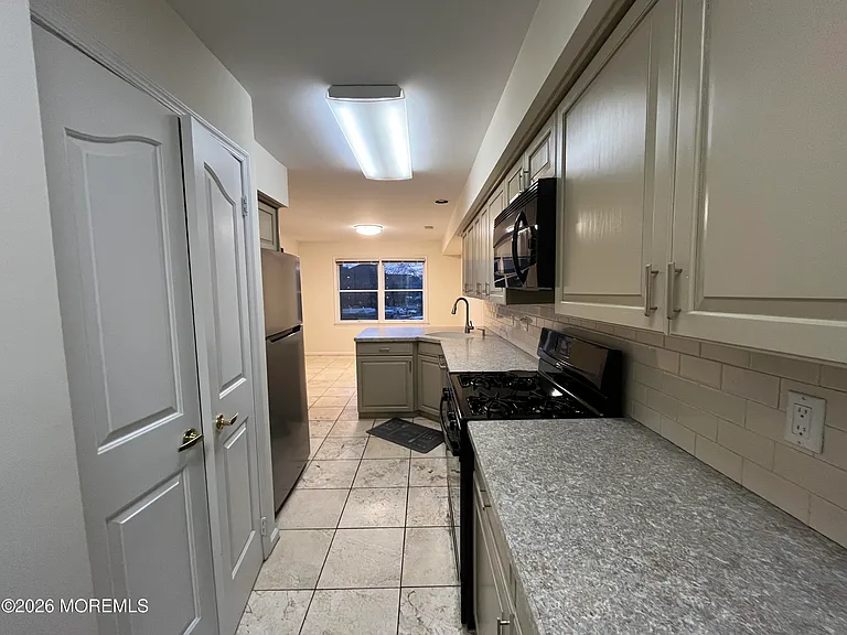 210 Spinnakers Cv — Photo 18