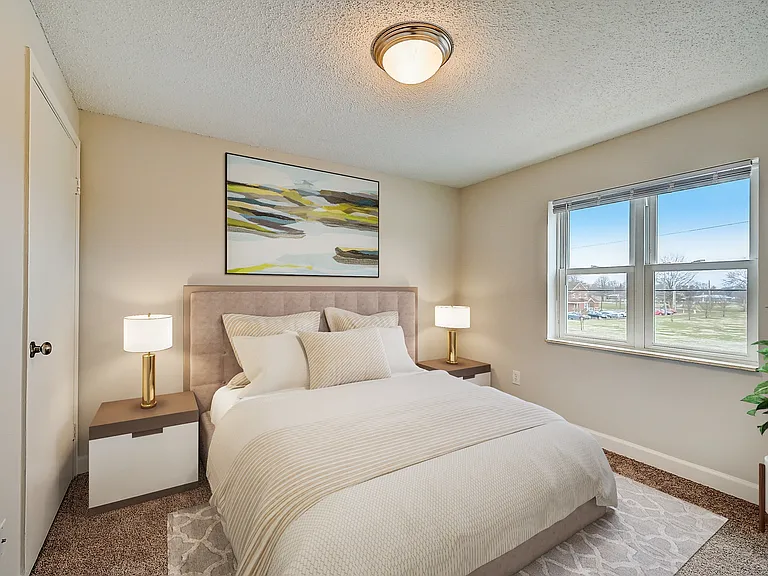 3 BR 1 BA Recently Renovated Townhouse Style Apartments featuring New gray carpet, Neutral paint scheme, Premium hardwood-style flooring, Neutral paint scheme, Upgraded light fixtures, New cabinets, Matching stainless steel appliances, Washer/Dryer, Air c