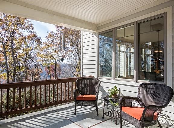 Front porch sitting area with wonderful views.