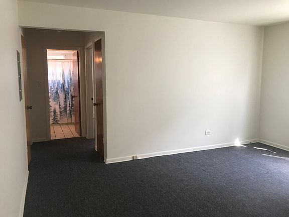 Hallway from living room to bedrooms and bathroom.