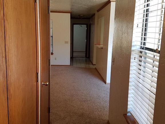 Looking down hallway from south bedroom