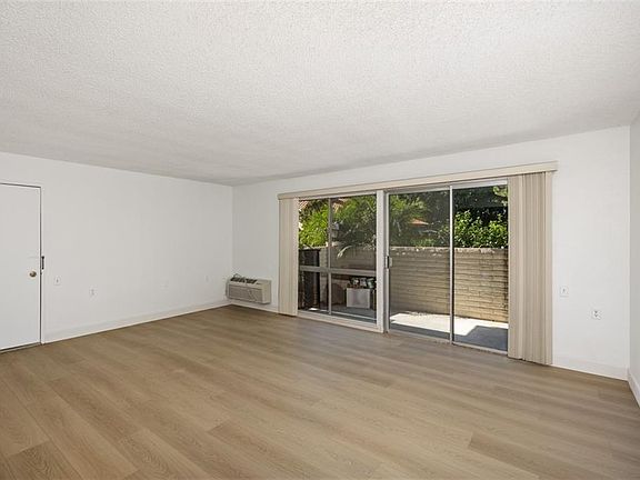 Here is a view of the living room with access to your own enclosed private patio